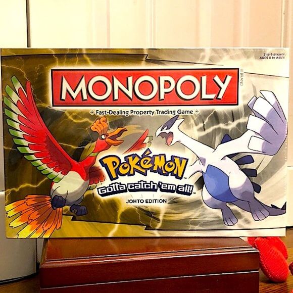 Hasbro Other - Hasbro POKEMON MONOPOLY Fast-Dealing Property Trading Game AGES 8+ NIB 2010